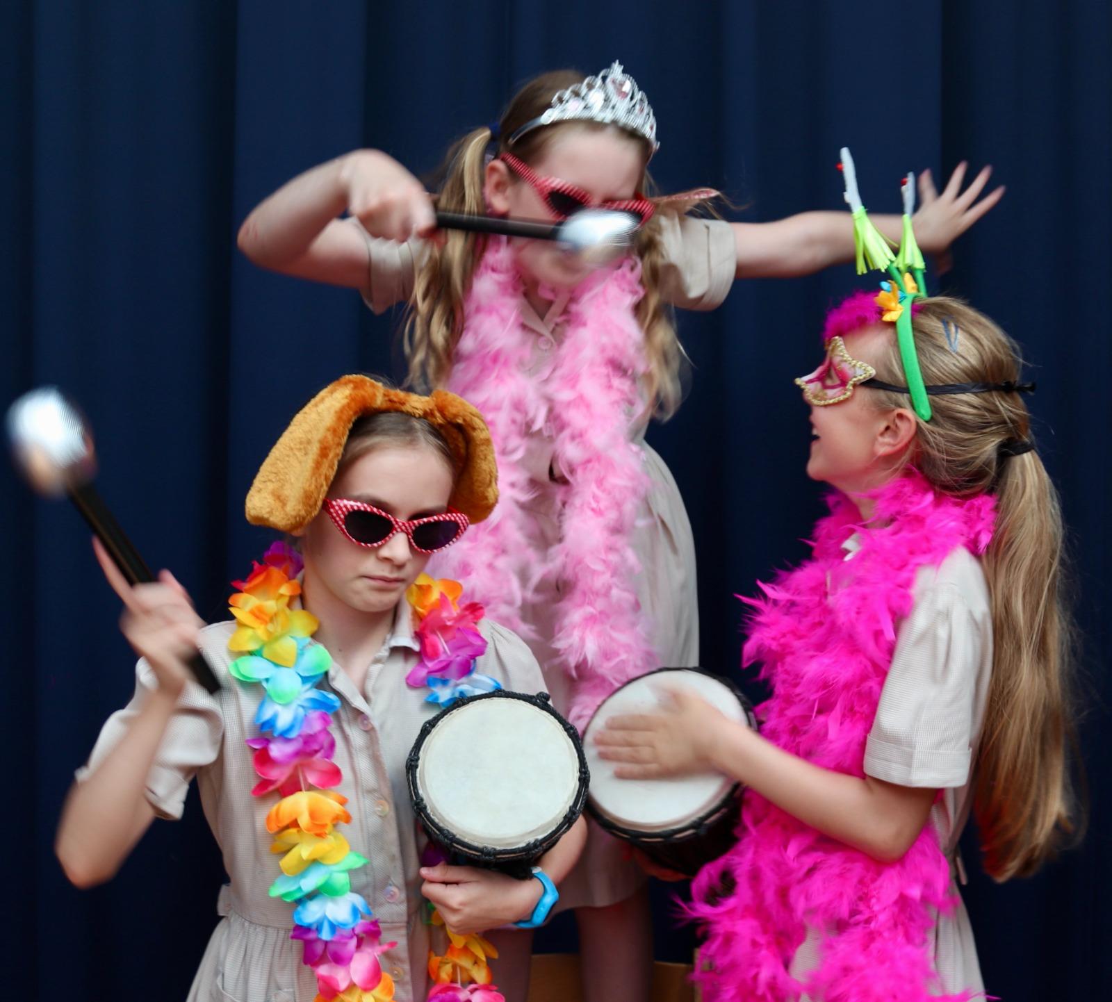 Children performing together in a school drama club